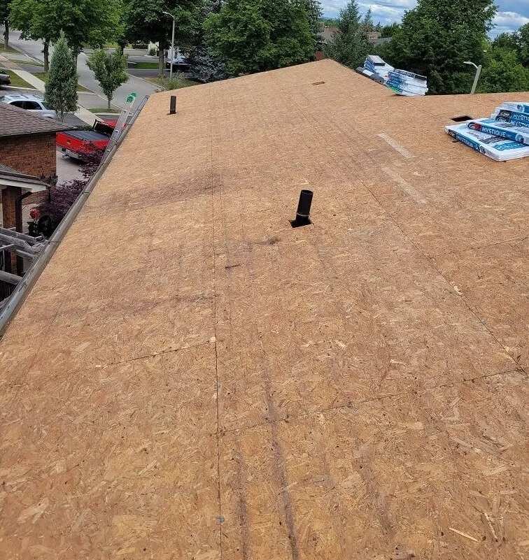 Removing the old roof on a house in York Region