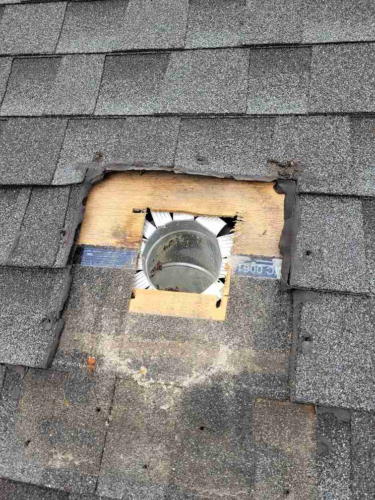 Removing an incorrect roof vent on a house